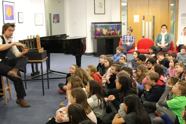 Jack delivering a talk to a group of children at school
