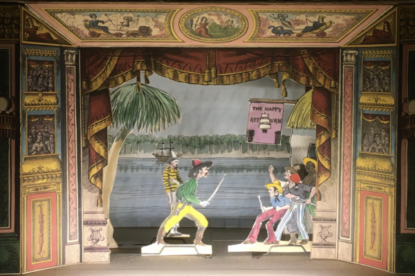 Paper theatre figures of pirates on a toy theatre stage